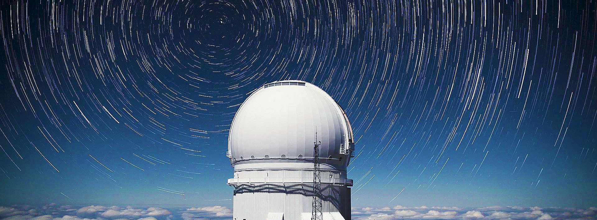 Photo of the Canada-France-Hawaii telescope on Mauna Kea volcano